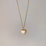 PARIS | VINTAGE SHELL LOVE PENDANT